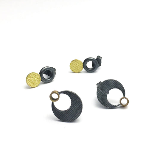 Textured gold and silver stud earrings
